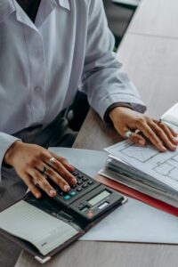 A manager analysing his operational costs